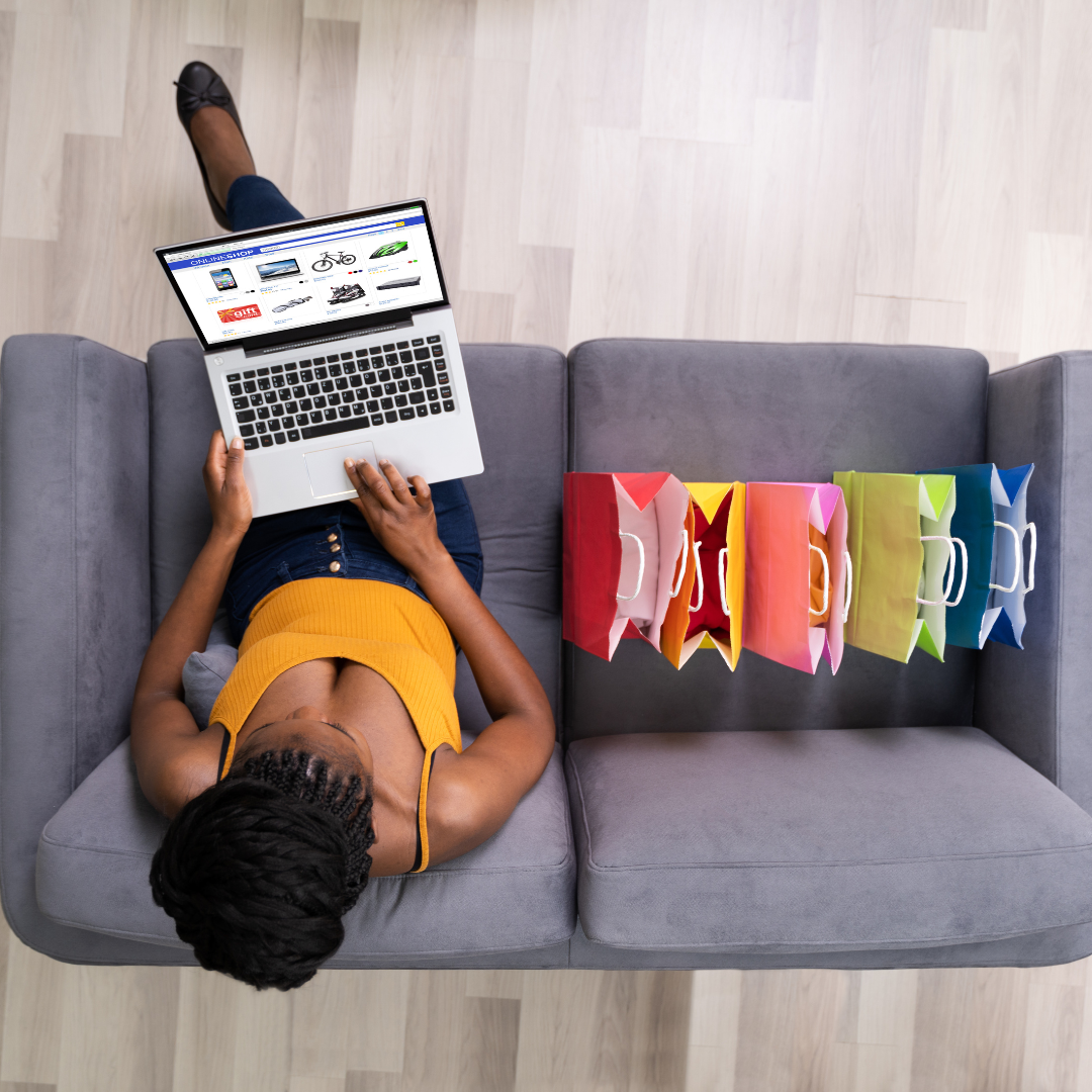 Victoria Brown explains how to connect with your customers better, with an image of a customer sitting on a sofa with a laptop and colourful shopping bags